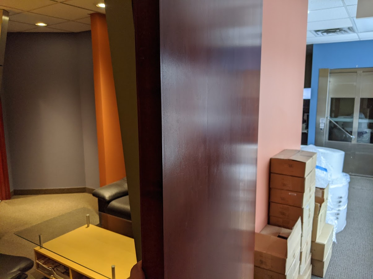 Upon exiting the final office space, though the door you are back in the reception area.